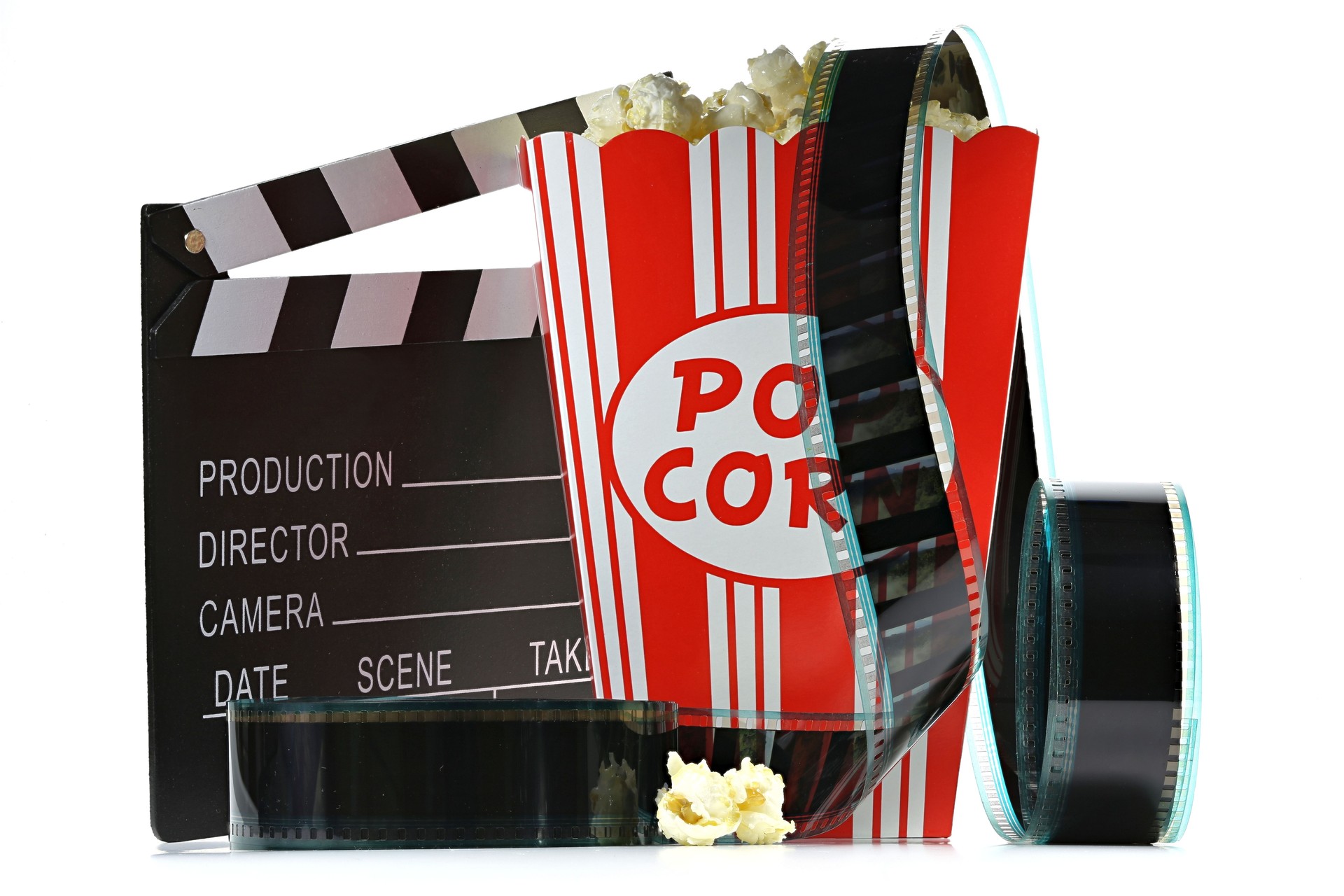 popcorn in a cardboard container with clapperboard and filmstrip